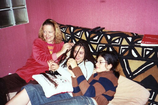 Françoise and Camille undoing Sophie's braids